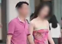 摄影师回应街拍国企领导与女子牵手 当时拍摄时他们没有拒绝