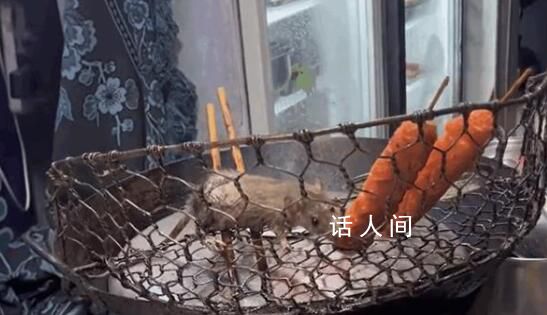 炸串店老鼠啃食香肠被网友拍下 老鼠主打一个明目张胆随心所欲