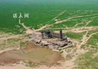 鄱阳湖水面面积13天缩水超四分之一 湖面露出滩涂和绿草