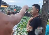 男子游泳被制止反将执法人员锁树上 公安机关已在处理