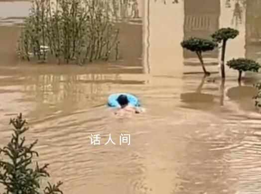 男子10次潜入洪水为救援队开小区大门 这位好汉还是退伍军人