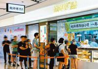 香港人“挤”去深圳做代购 消费热情从口岸蔓延各区
