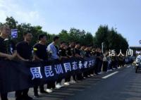 烈士周昆训安葬现场妻子哭到晕厥 趴在墓前说会照顾好老人和孩子