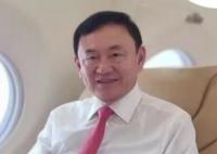 他信回国后被拘留 面临10年刑期