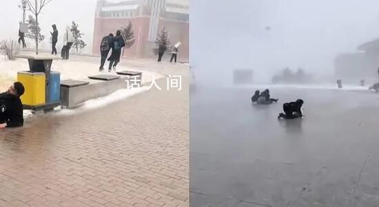 东北风雪天有多猛?市民手牵手被吹翻