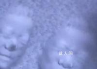 在大雪后的车盖上印鬼脸有多好笑 引发了网友们的一片哄笑