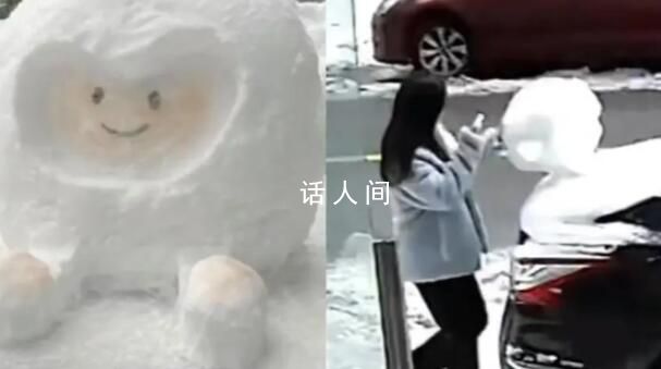 车主在车上堆雪人 女子拍照后踢坏