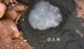专家辟谣青岛三浴海边有火山蛋 这些石头是火成岩